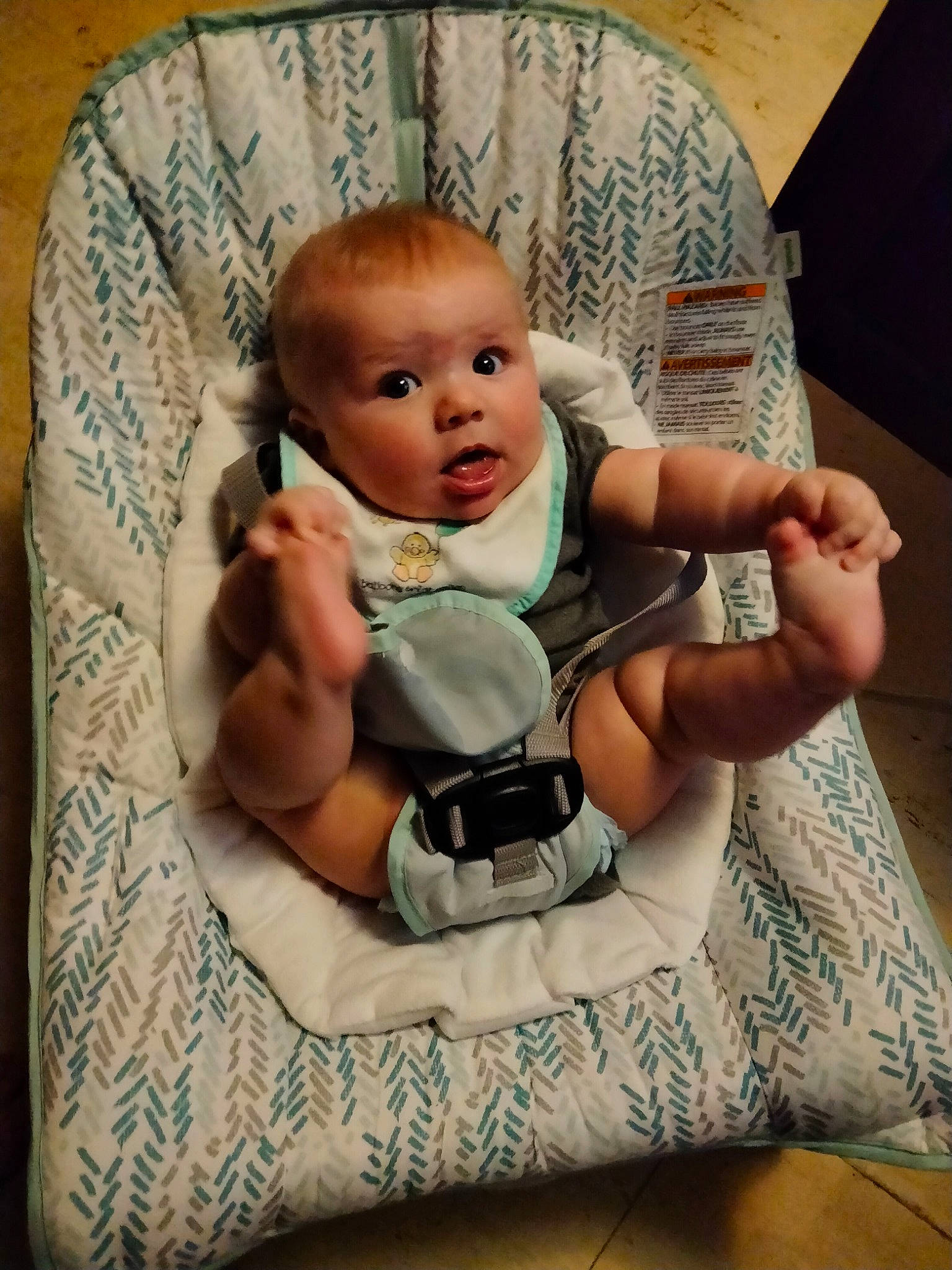 Konner joined the competition — help win amazing prizes! baby, baby_carriage, baby_products, baby_safety, baby_toddler_clothing, chair, cheek, chest, child, comfort, eye, finger, human_body, lap, linens, person, product, sitting, skin, surprise