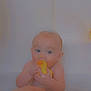 Jay is registered to the contest to win money with this photo: baby, child, rubber_duck, bath, water, bubbles, hand, rings, blue_eyes, toy, tub, skin, cute, infant, person, indoors, playing, fun, young, smiling