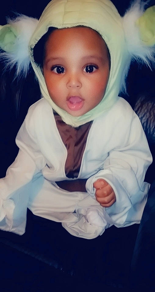 Jacoby is registered to the contest to win money with this photo: baby, baby_toddler_clothing, cheek, child, child_model, comfort, eye, hood, nose, person, photo_shoot, portrait_photography, skin, surprise, toddler