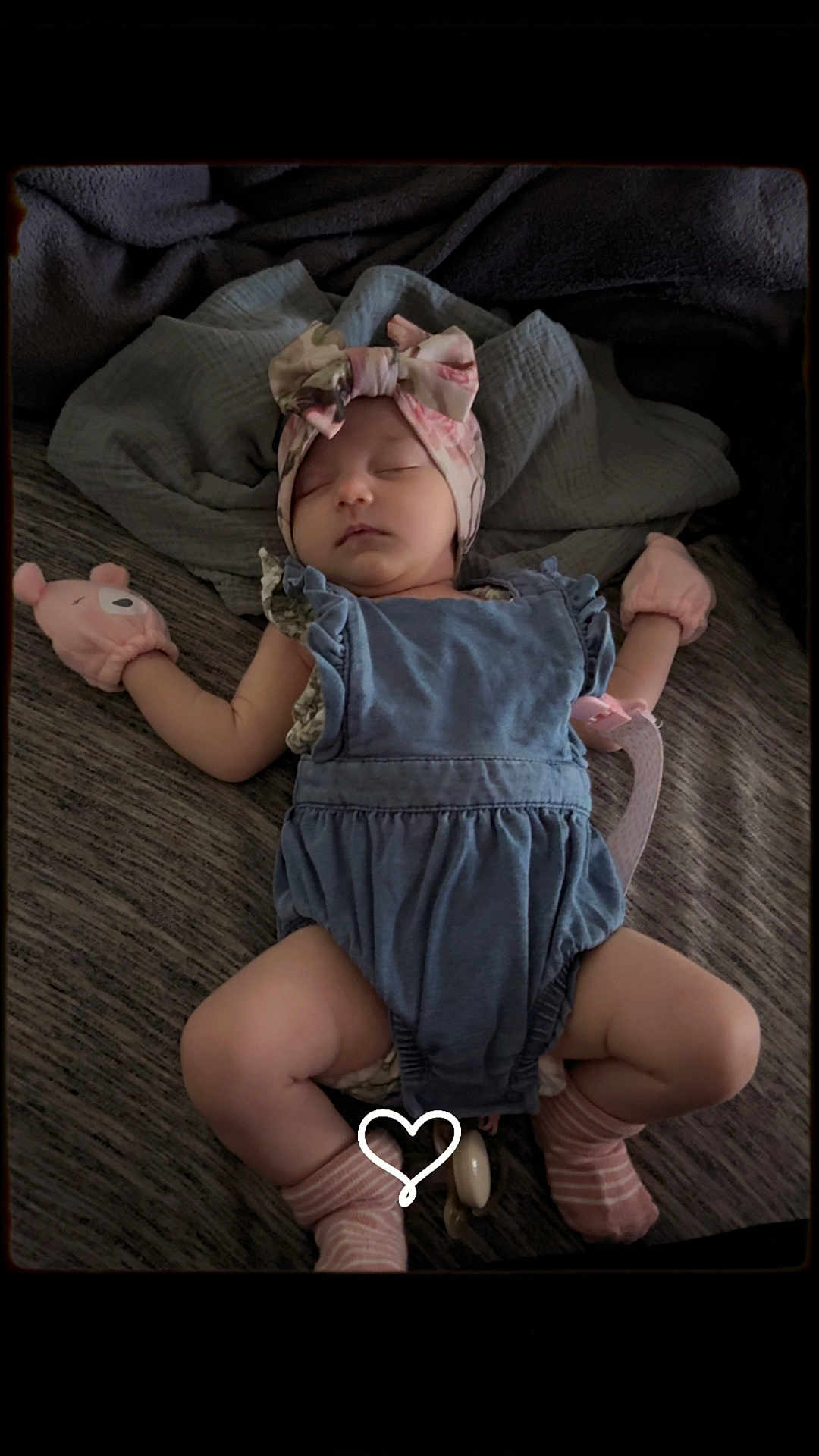 Everleigh is registered to the contest to win money with this photo: baby, sleeping, romper, headband, bow, mittens, blanket, pink, blue, infant, cute, peaceful, cozy, heart, soft, clothing, person, indoor, resting, newborn