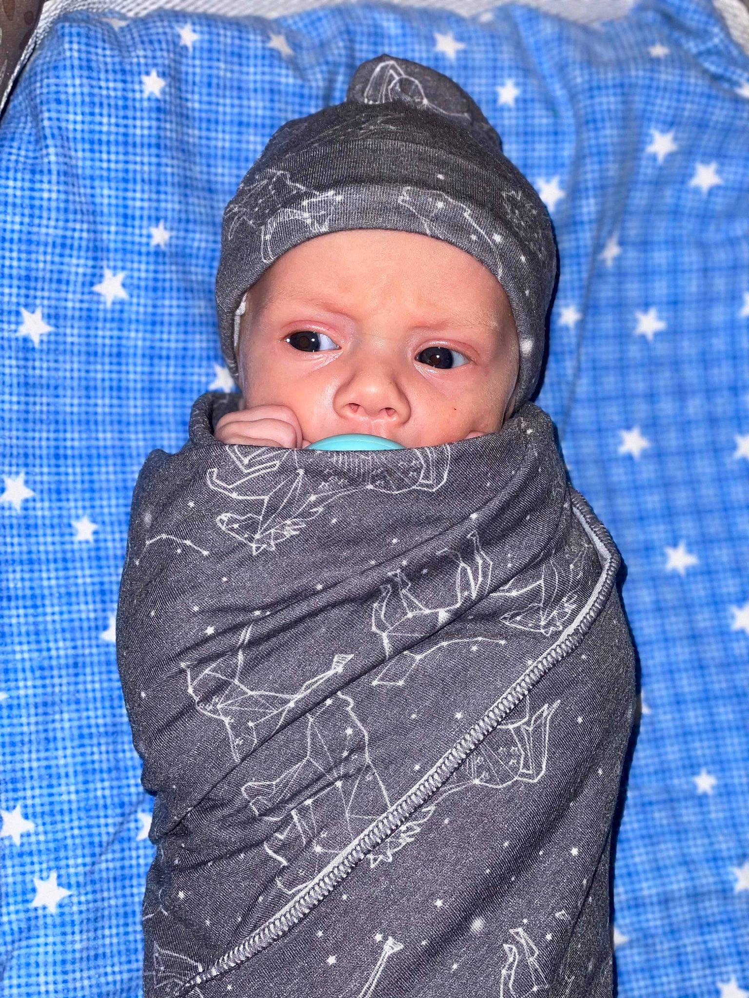 Dawson joined the competition — help win amazing prizes! baby, baby_products, baby_toddler_clothing, beanie, cap, cheek, child, electric_blue, fashion_accessory, freezing, headwear, hood, human_body, knit_cap, pattern, person, sleeve, snow, toddler, winter