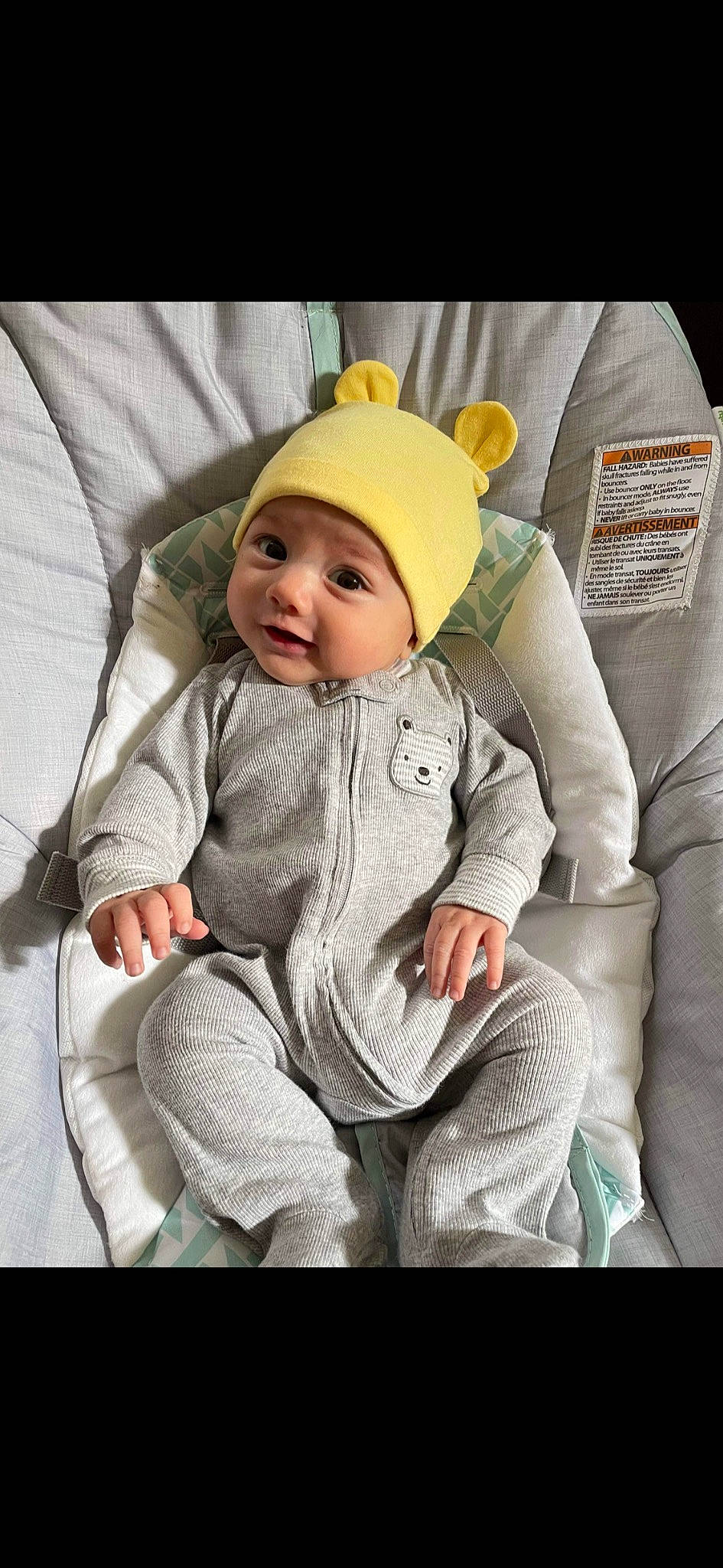 Isaiah joined the competition — help win amazing prizes! baby, baby_carriage, baby_products, baby_safety, baby_toddler_clothing, beanie, box, cap, car_seat, cheek, child, comfort, eye, head, headwear, linens, pattern, person, room, sitting