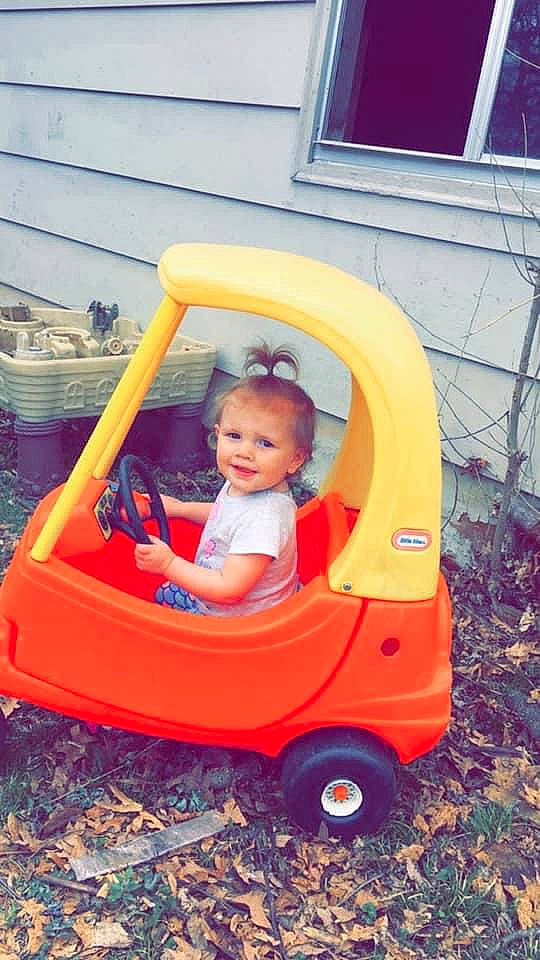 Myah is registered to the contest to win money with this photo: baby_products, car, child, fun, joy, person, play, product, riding_toy, toddler, toy, vehicle, yellow