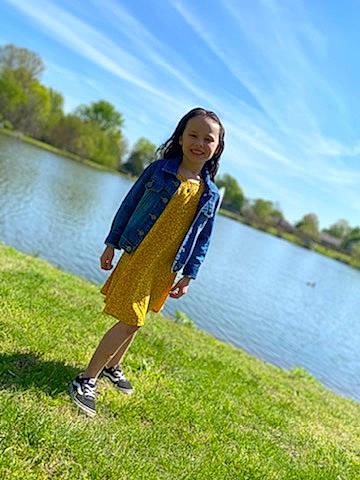 Halo is registered to the contest to win money with this photo: cloud, flash_photography, footwear, fun, grass, grassland, happy, joy, lake, landscape, leisure, meadow, nature, people_in_nature, person, plant, sky, street_fashion, summer, tree