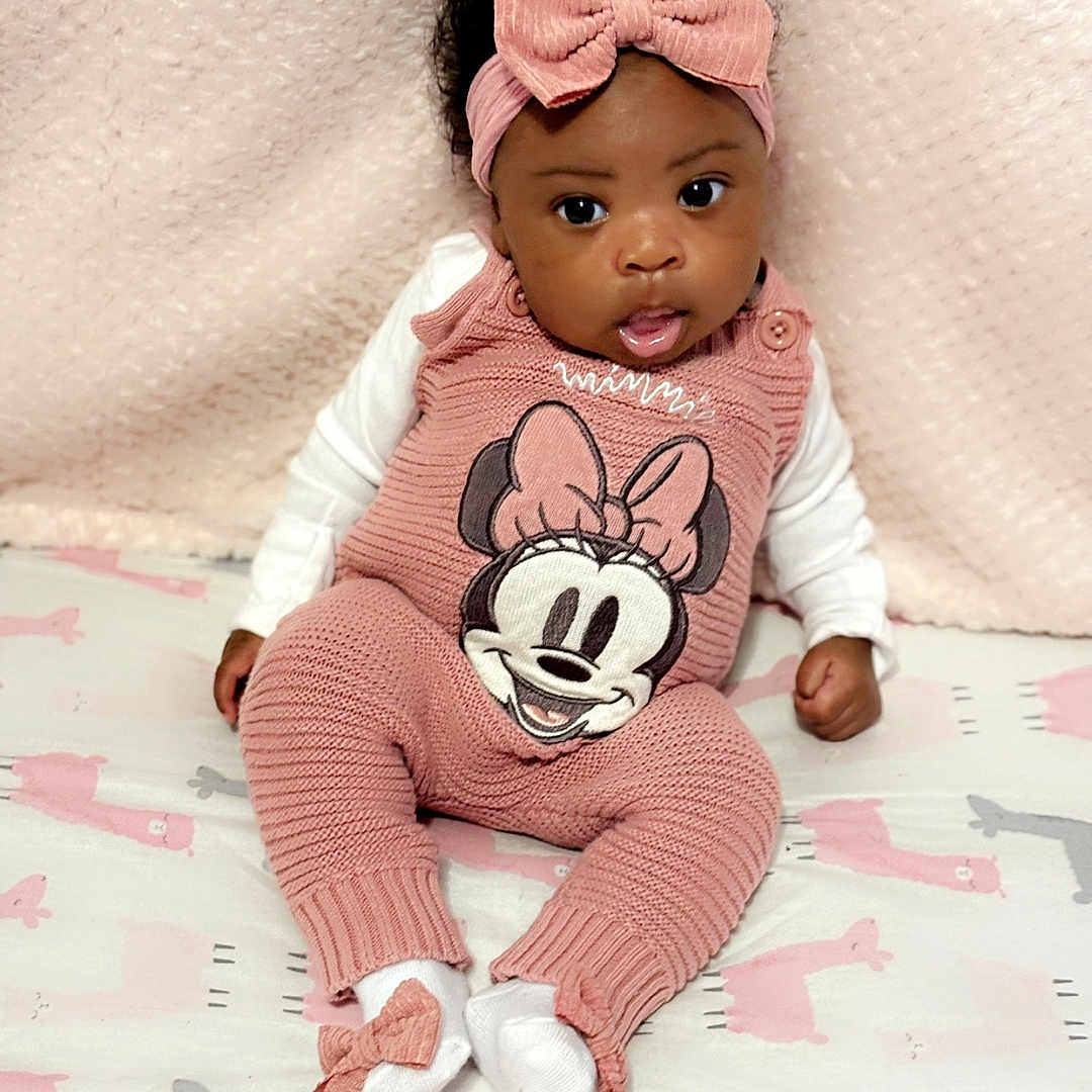 Jaelani joined the competition — help win amazing prizes! baby, bodypart, bonnet, cap, clothing, couch, doll, face, finger, furniture, hand, hat, head, knitwear, person, photography, portrait, sitting, sweater, toy