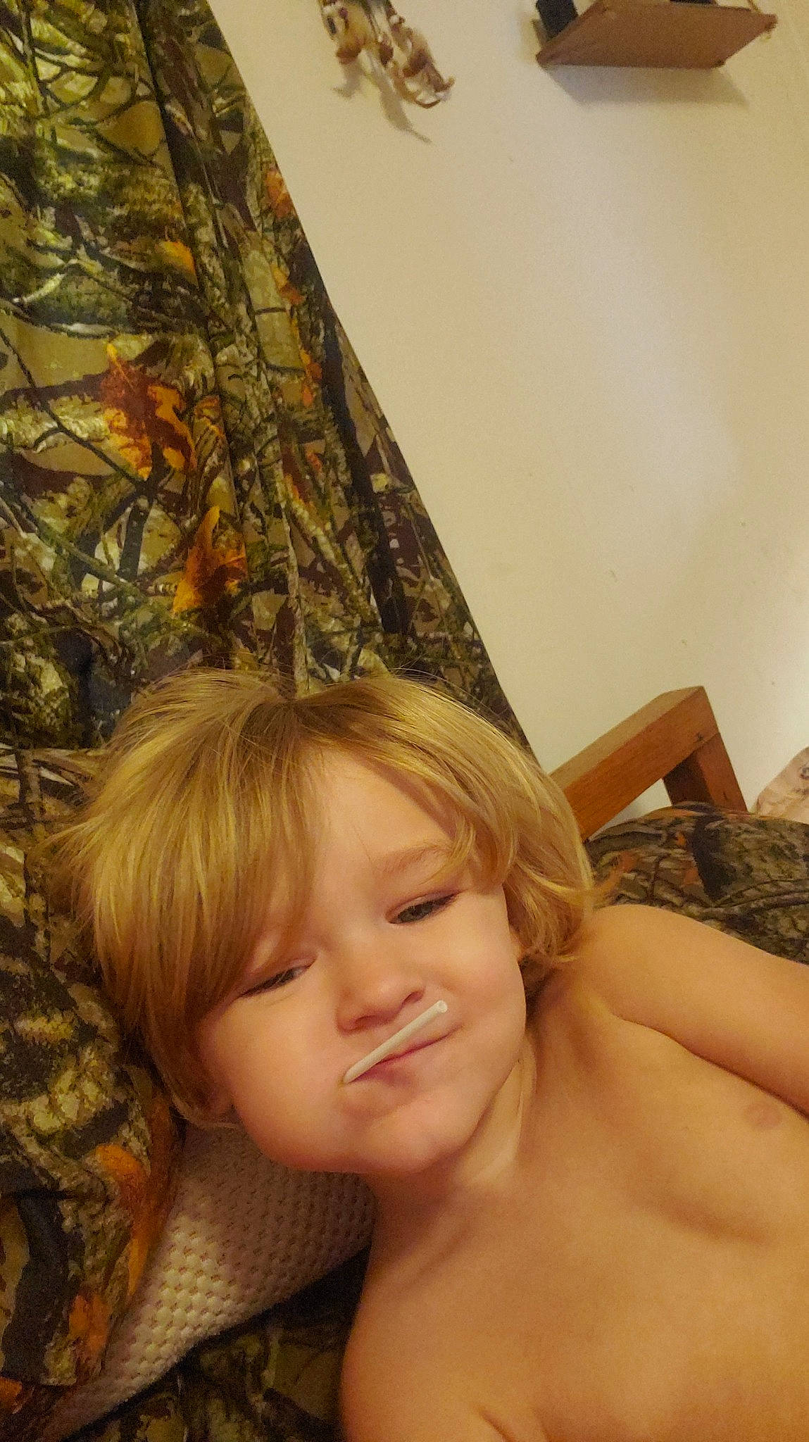 Dylan joined the competition — help win amazing prizes! barechested, blond, brown_hair, chest, child, eyelash, fawn, flooring, fun, happy, human_leg, long_hair, people_in_nature, person, room, sitting, smile, surfer_hair, tree, trunk