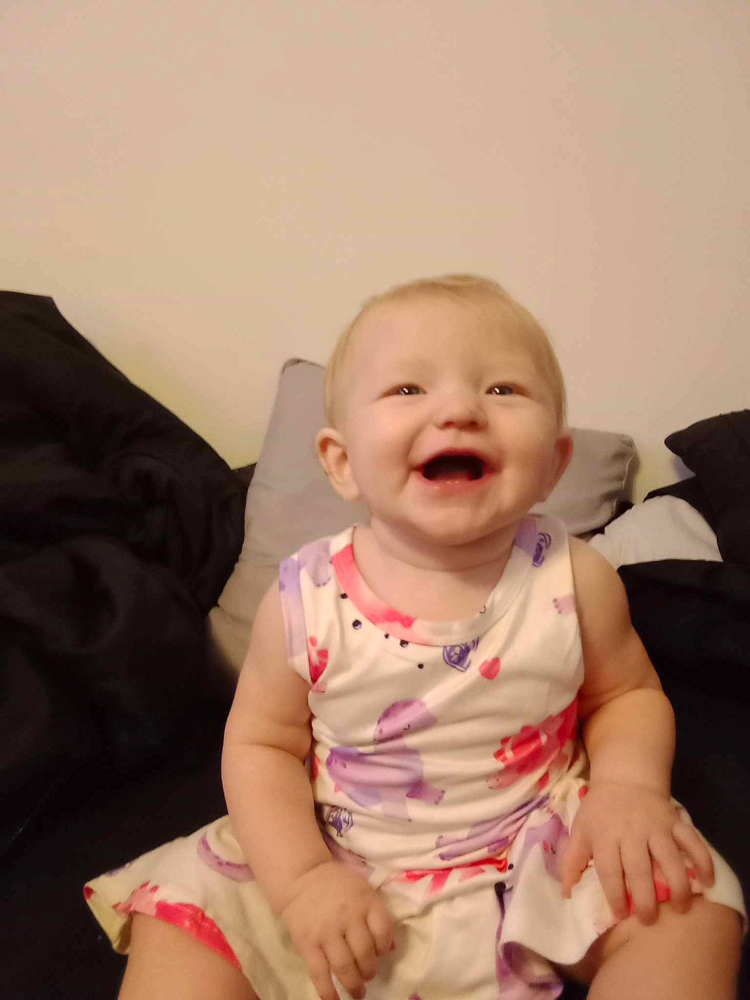 Rosaly is registered to the contest to win money with this photo: baby, baby_toddler_clothing, cheek, chin, comfort, eye, face, finger, flash_photography, happy, head, iris, joy, lip, mouth, person, pink, skin, sleeve, smile