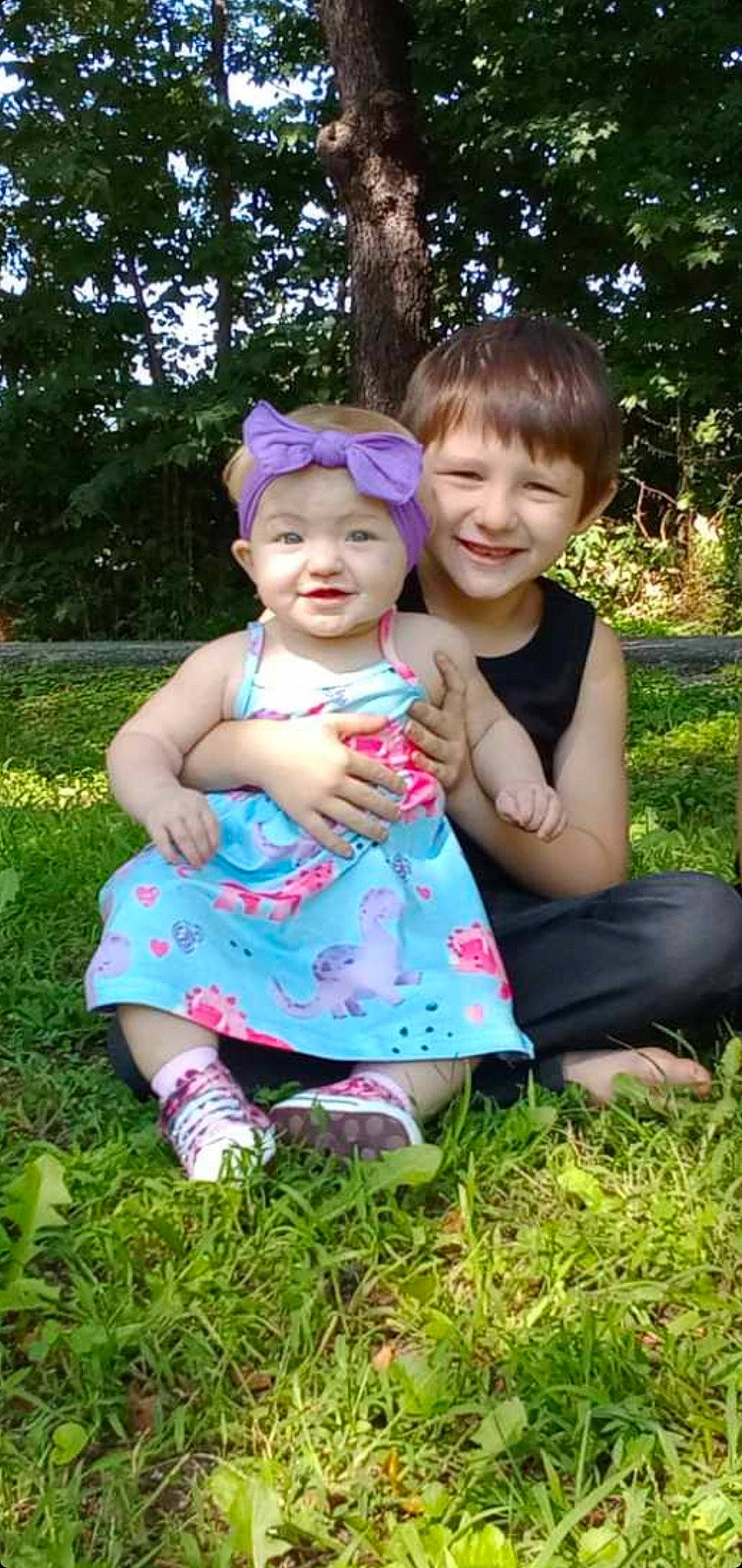 Jeremy is registered to the contest to win money with this photo: baby, baby_toddler_clothing, child, eye, fun, gesture, grass, grass_family, happy, hat, headwear, joy, leaf, leisure, people_in_nature, person, photograph, pink, plant, recreation