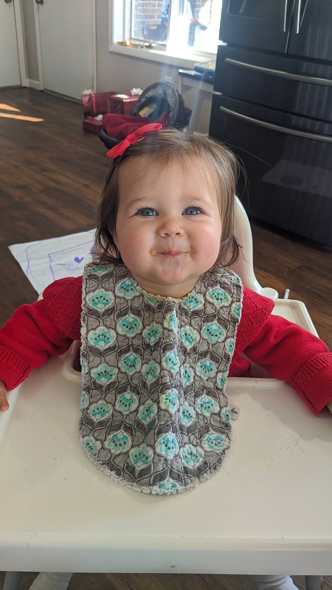 Emmaline is registered to the contest to win money with this photo: baby, baby_products, baby_toddler_clothing, child, dress, eyelash, facial_expression, flooring, fun, happy, headgear, iris, linens, outerwear, pattern, person, pink, skin, sleeve, smile