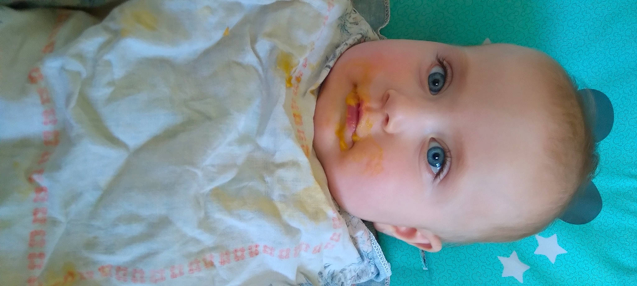 Erwan participe au concours pour gagner de l'argent avec cette photo : baby, baby_toddler_clothing, cheek, child, comfort, eye, eyebrow, eyelash, grass, happy, iris, lip, nose, person, plant, skin, sleeve, smile, toddler, water