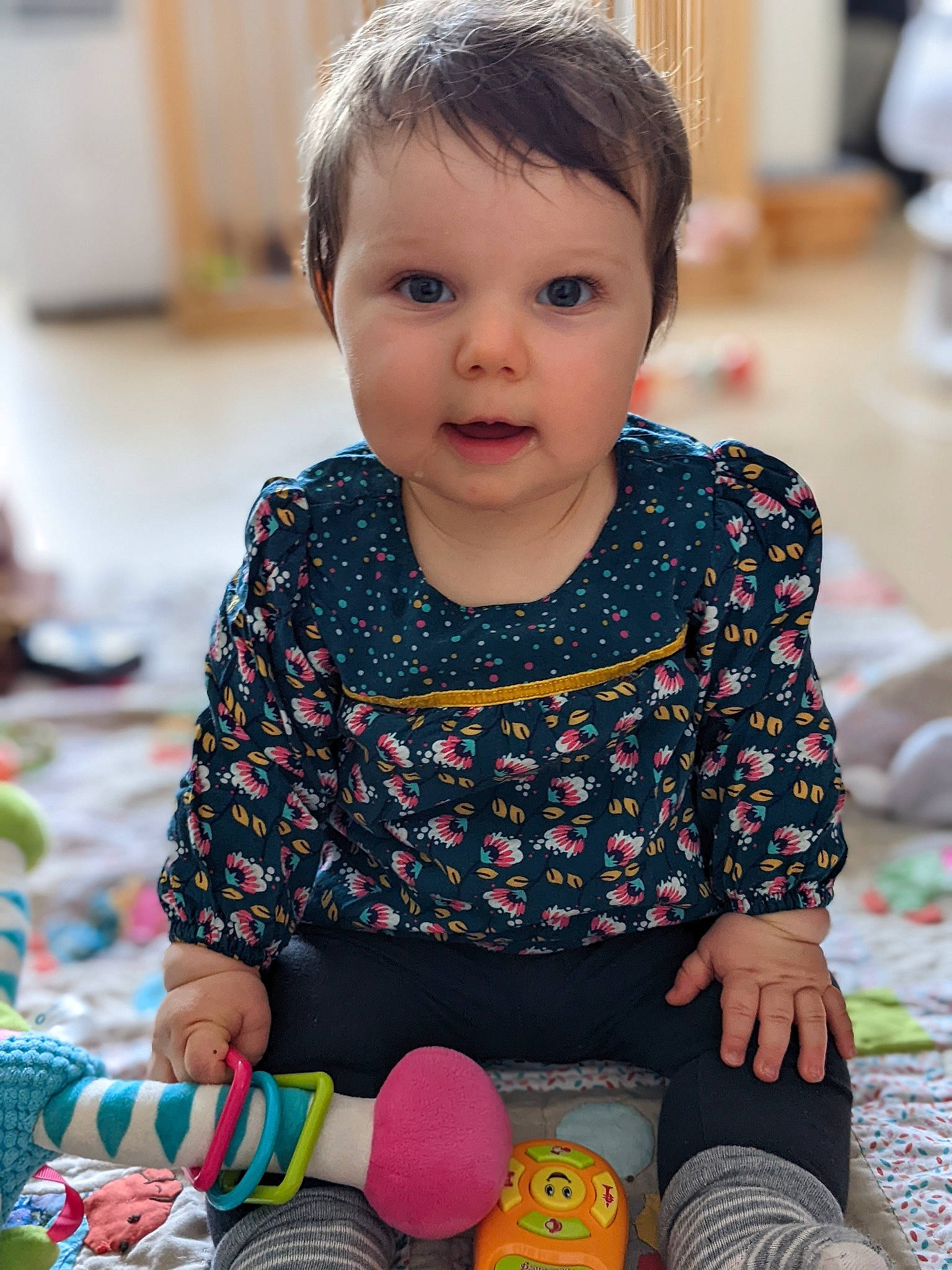 Alix participe au concours pour gagner de l'argent avec cette photo : baby, baby_playing_with_toys, baby_toddler_clothing, black, cheek, child, dress, eye, fun, happy, head, iris, leisure, people, person, photograph, skin, snapshot, summer, surprise