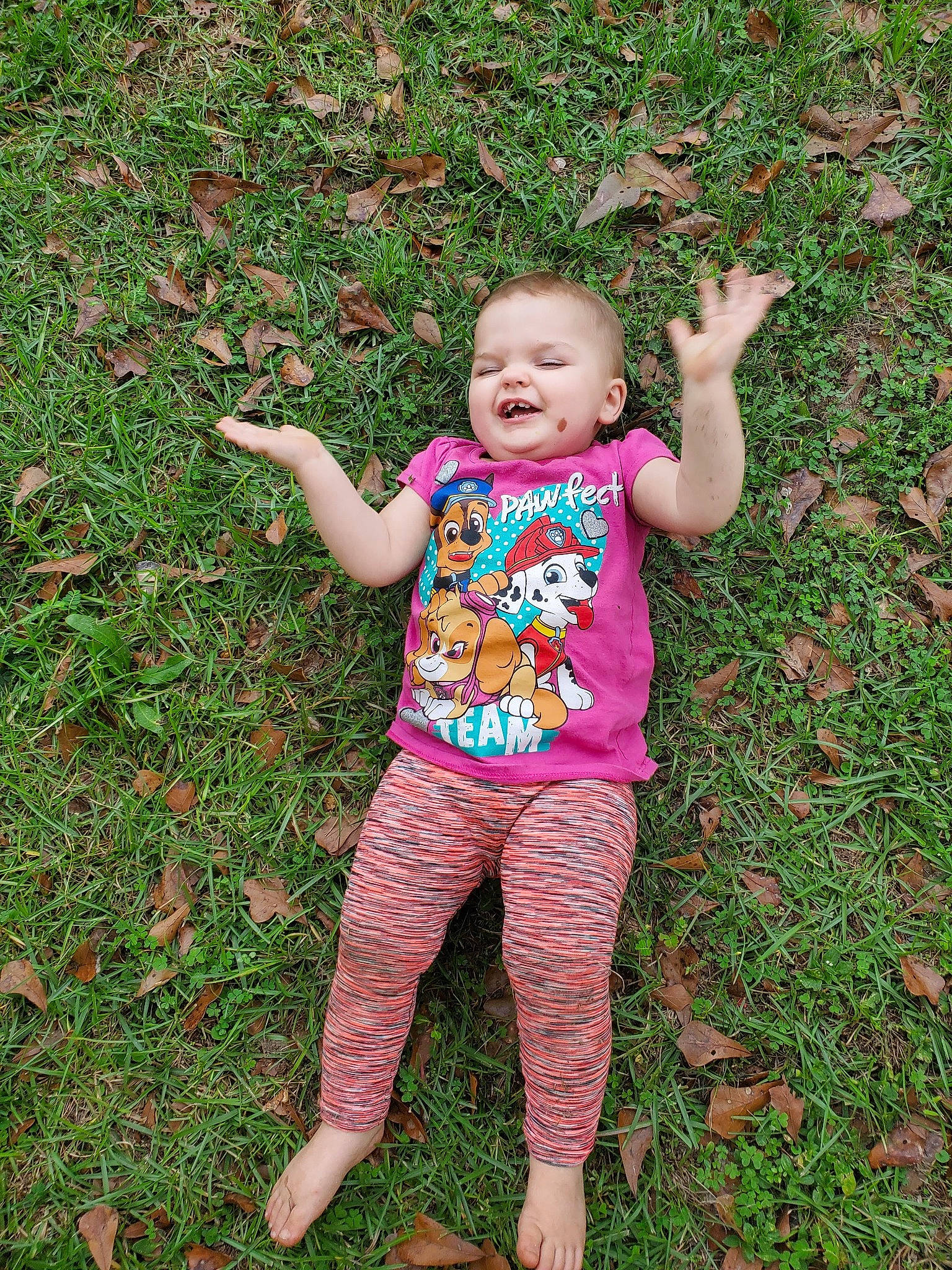 Raven is registered to the contest to win money with this photo: barefoot, child, fun, grass, grass_family, lawn, leaf, people_in_nature, person, plant, play, toddler