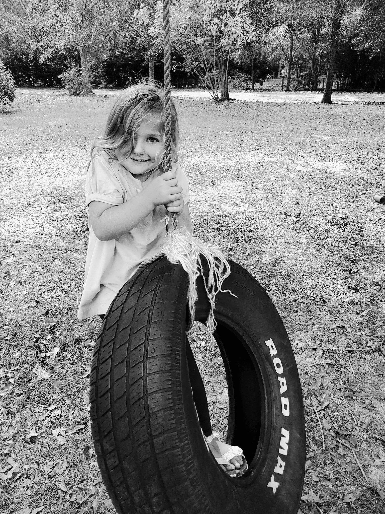 Penelope joined the competition — help win amazing prizes! auto_part, automotive_tire, automotive_wheel_system, black, black_and_white, child, joy, monochrome, monochrome_photography, natural_rubber, person, photograph, photography, rim, smile, stock_photography, synthetic_rubber, tire, tire_care, tread