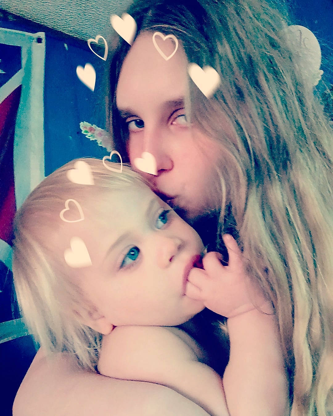 April is registered to the contest to win money with this photo: baby, black_hair, cheek, child, cool, electric_blue, facial_expression, flash_photography, fun, gesture, grass, hair, hairstyle, happy, iris, lip, people_in_nature, person, plant, skin