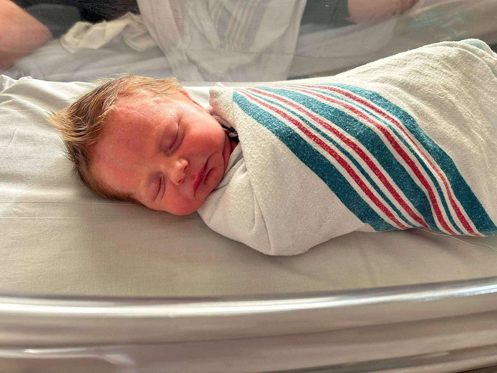 Finn is registered to the contest to win money with this photo: baby, baby_products, baby_sleeping, bed_sheet, bedding, bedtime, child, childbirth, comfort, couch, elbow, flesh, human_leg, knee, linens, nap, person, room, sleep, sleeve