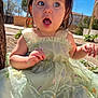 toddler, child, outdoor, dress, green_dress, embroidery, curious, surprised, sunlight, blue_sky, tree, nature, young, person, portrait, sitting, cute, baby, happy, daylight