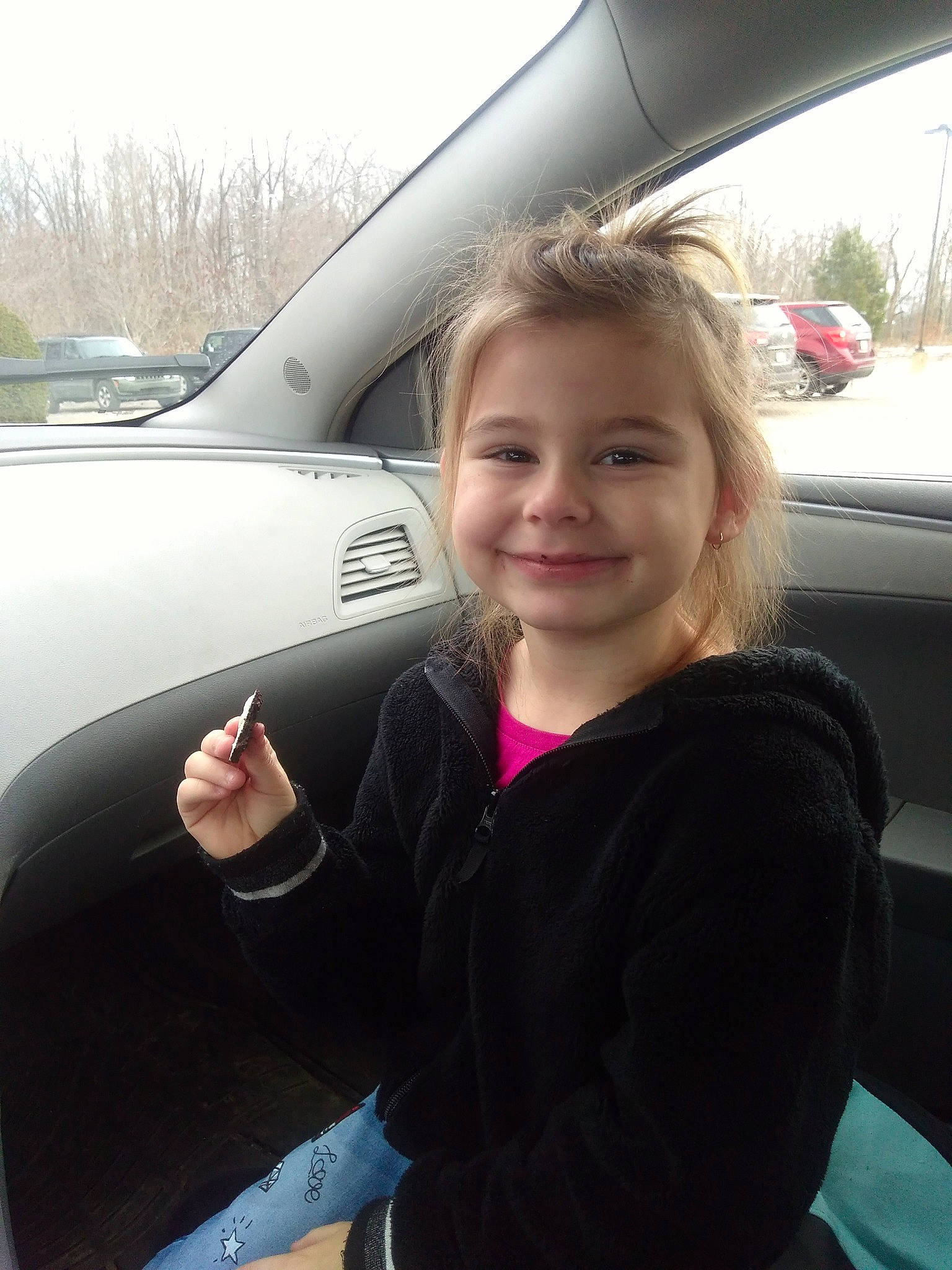 Barbara is registered to the contest to win money with this photo: automotive_exterior, automotive_mirror, automotive_side_view_mirror, automotive_window_part, blond, car_seat, eye, family_car, glass, head_restraint, joy, luxury_vehicle, person, tooth, vehicle_door, windshield