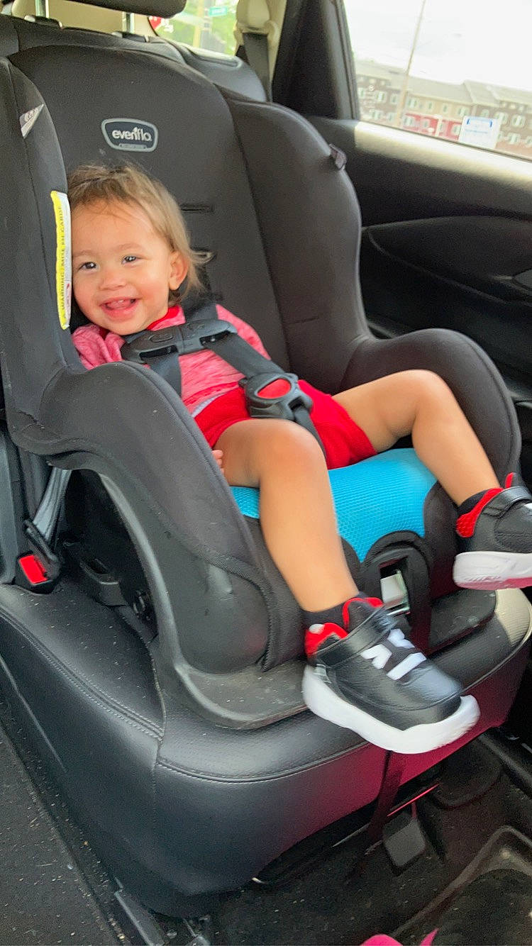 Dessiah is registered to the contest to win money with this photo: auto_part, automotive_design, automotive_exterior, automotive_wheel_system, car, car_seat, car_seat_cover, comfort, joy, lap, leg, mode_of_transport, motor_vehicle, person, personal_luxury_car, smile, steering_wheel, thigh, toddler, vehicle
