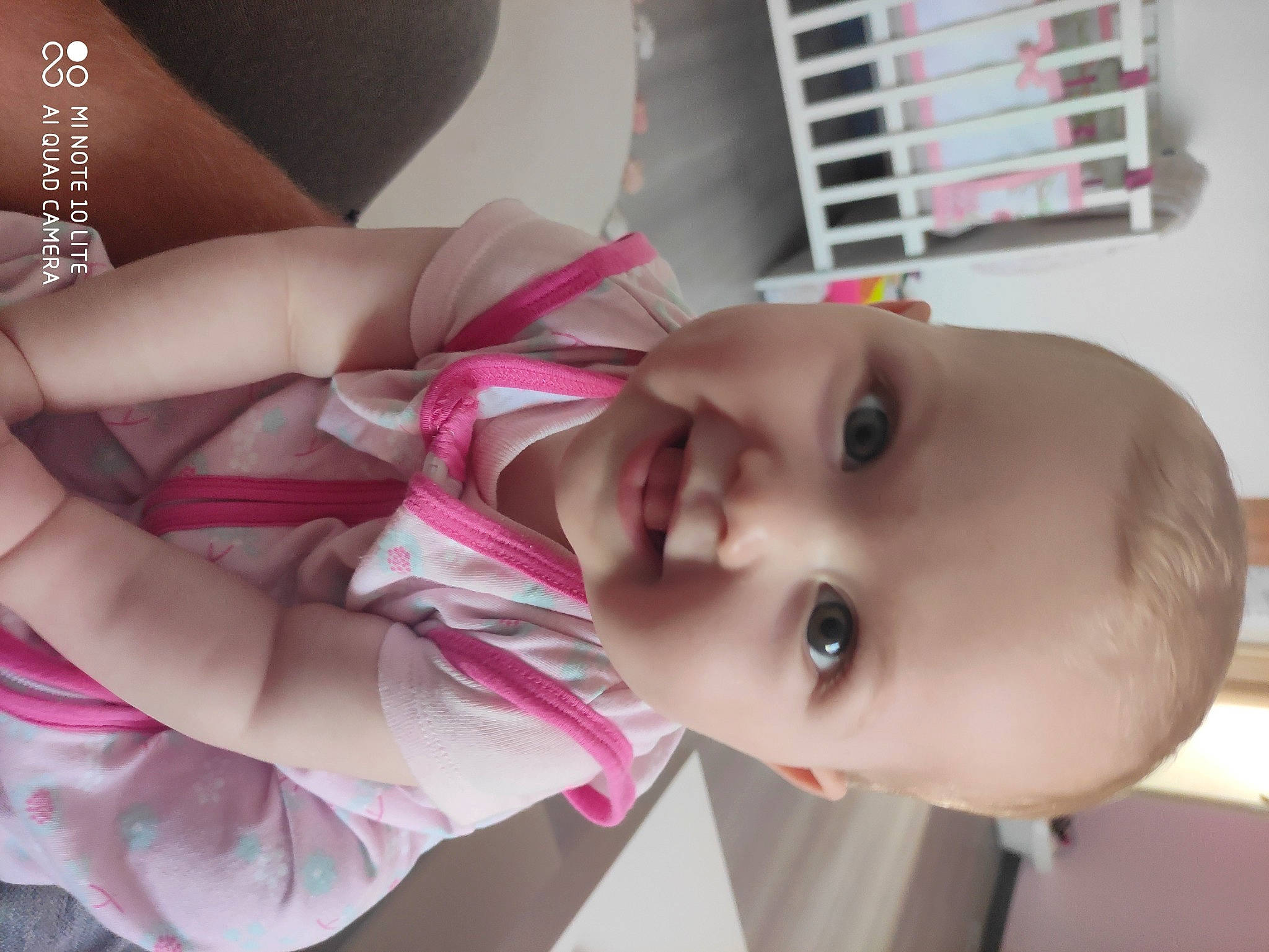 Marie participe au concours pour gagner de l'argent avec cette photo : arm, baby, baby_products, baby_toddler_clothing, cheek, child, dress, eye, eyelash, finger, happy, human_body, iris, lip, mouth, nose, person, skin, smile, toddler