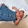 baby, infant, denim, headband, white, blanket, cute, child, portrait, lying_down, clothing, newborn, small, adorable, face, hand, skin, sleepy, indoors, soft