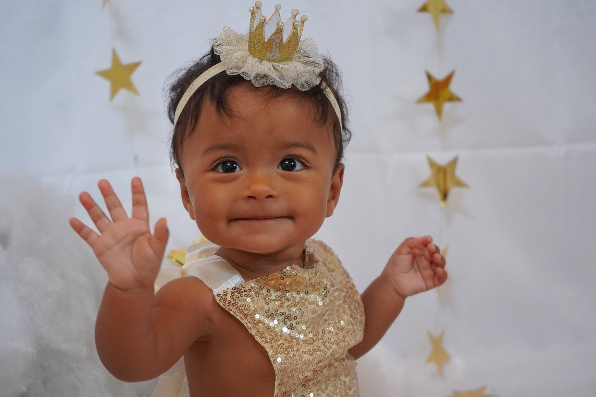 Sitara is registered to the contest to win money with this photo: baby, baby_toddler_clothing, cheek, child, ear, eye, eyebrow, eyelash, facial_expression, finger, fun, gesture, happy, head, headgear, headpiece, joy, person, skin, smile