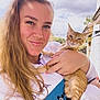 Pride is registered to the contest to win money with this photo: cartoon, cat, closeup, clouds, embroidered_design, garden, ginger_cat, holding, kitten, long_hair, nails, outdoor, person, pet, ponytail, portrait, selfie, sky, smile, sweater