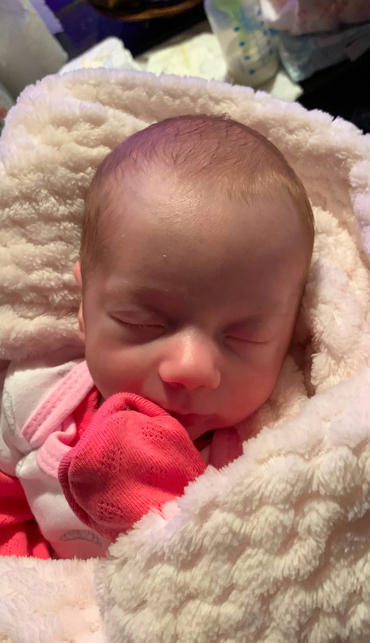 Alaska is registered to the contest to win money with this photo: baby, baby_sleeping, birth, blanket, cheek, child, close_up, eye, face, fur, head, lip, mouth, nap, nose, person, pink, skin, sleep, toddler