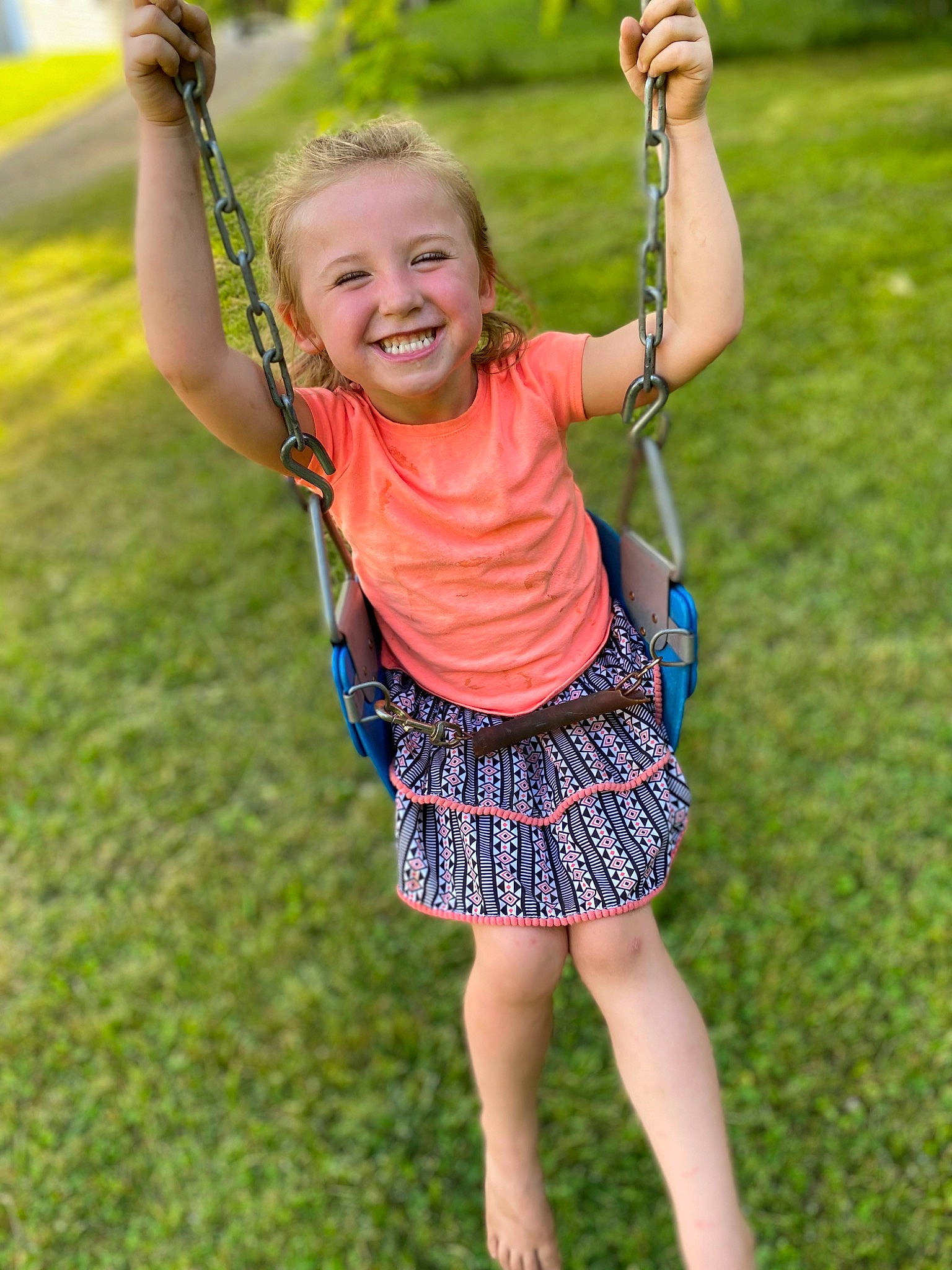 Alexis is registered to the contest to win money with this photo: baby_toddler_clothing, eye, fun, gesture, grass, grass_family, grassland, happy, joy, leaf, leisure, meadow, nature, people_in_nature, person, recreation, sleeve, smile, summer, t_shirt
