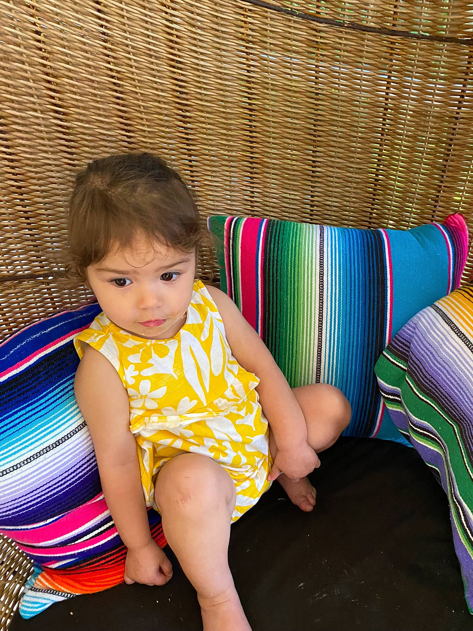 Elena is registered to the contest to win money with this photo: arm, baby, baby_toddler_clothing, barefoot, blue, child, foot, fun, grass, happy, human_body, human_leg, knee, leg, leisure, pattern, person, shorts, sitting, thigh