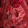 Ariannys is registered to the contest to win money with this photo: baby, infant, child, portrait, sitting, pacifier, headband, bow, pink, clothing, patterned_outfit, onesie, blanket, cushion, indoor, seated, dark_lighting, close_up, baby_toy, face