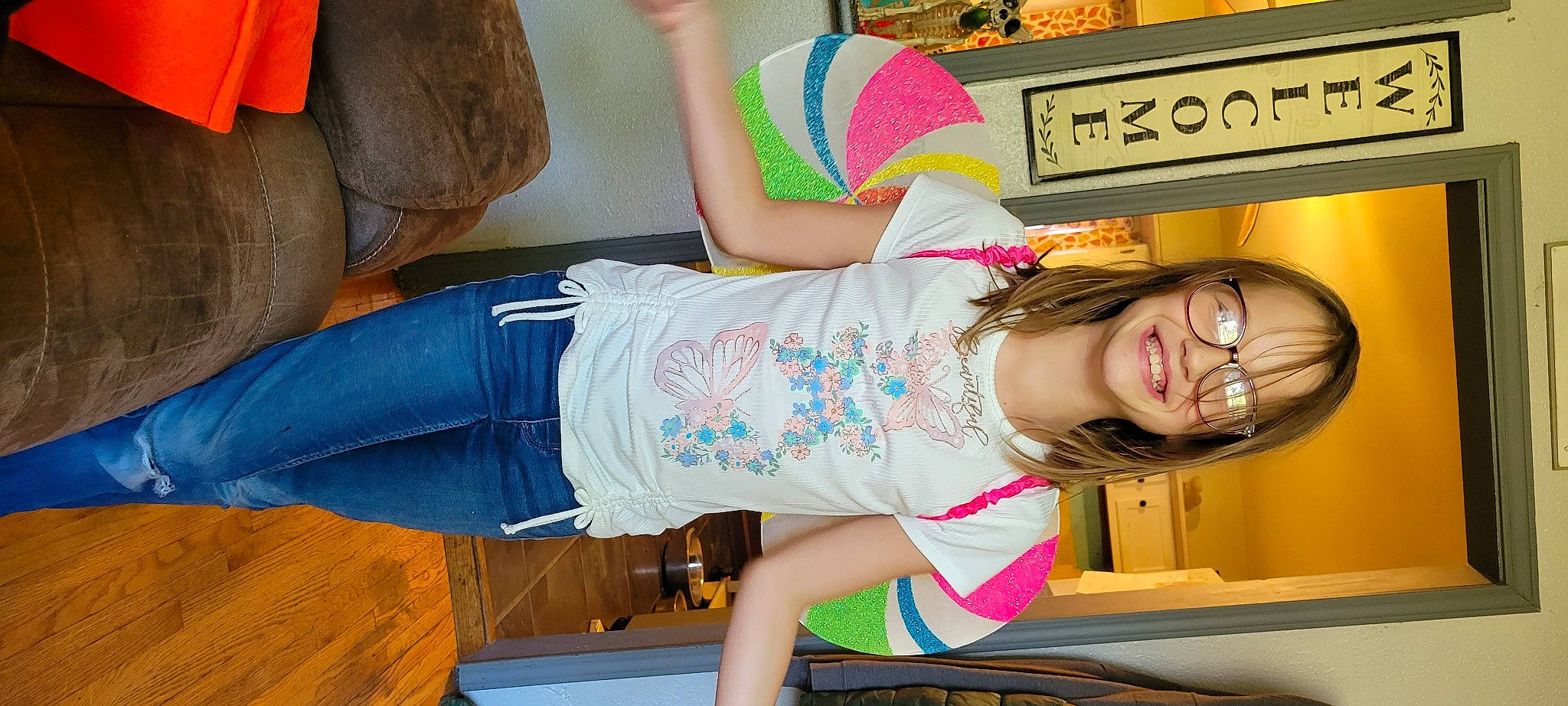 Emma Anne is registered to the contest to win money with this photo: arm, child, comfort, finger, fun, happy, human_leg, joint, joy, knee, leg, leisure, neck, pattern, person, room, shoulder, sitting, sleeve, smile