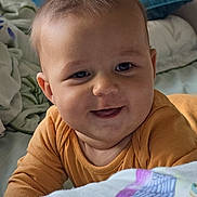 Dominic joined the competition — help win amazing prizes! baby, bed, bedroom, blanket, couch, cushion, face, furniture, happy, head, homedecor, indoors, laughing, person, photography, pillow, portrait, quilt, room, smile