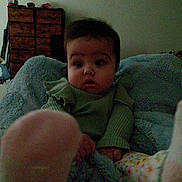 Grace is registered to the contest to win money with this photo: baby, blanket, carpet, child, clothing, cozy, curious, dresser, feet, furniture, home, indoors, infant, person, portrait, room, sitting, soft, wide_eyes, young