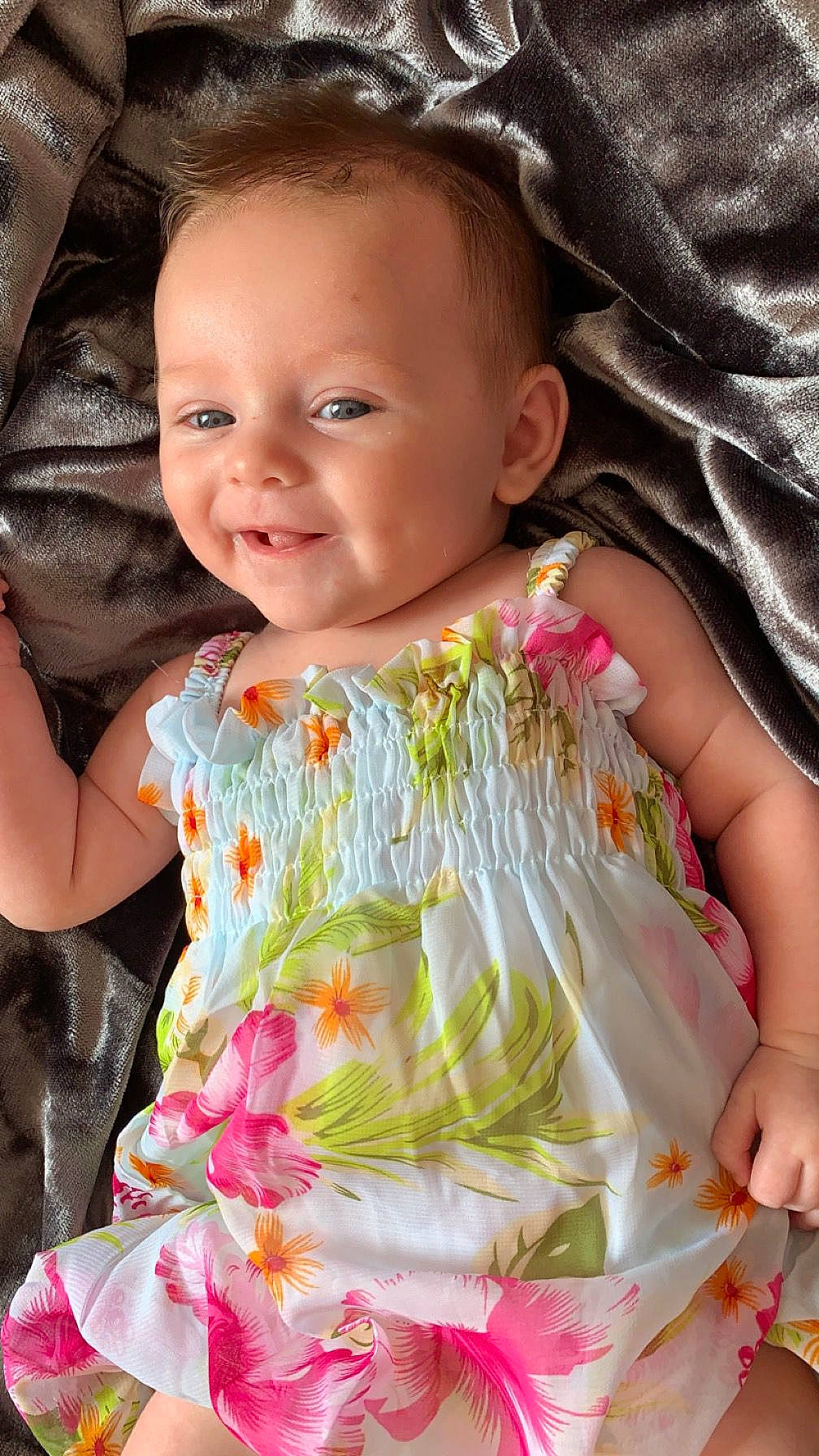 Darcie is registered to the contest to win money with this photo: baby, baby_products, baby_toddler_clothing, beauty, cheek, child, dress, eye, facial_expression, hairstyle, happy, iris, pattern, people_in_nature, person, pink, skin, sleeve, smile, textile