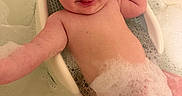 Ezra joined the competition — help win amazing prizes! baby, bath, foam, bubbles, water, child, tub, skin, cute, smiling, happy, playful, infant, head, face, hand, arm, leg, bubble_crown, relaxation