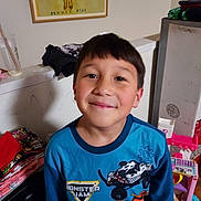 Jesse joined the competition — help win amazing prizes! background, boy, casual, child, clothing, colorful, face, furniture, hair, happy, home, indoor, monster_jam, person, playroom, portrait, shirt, smile, toy, young