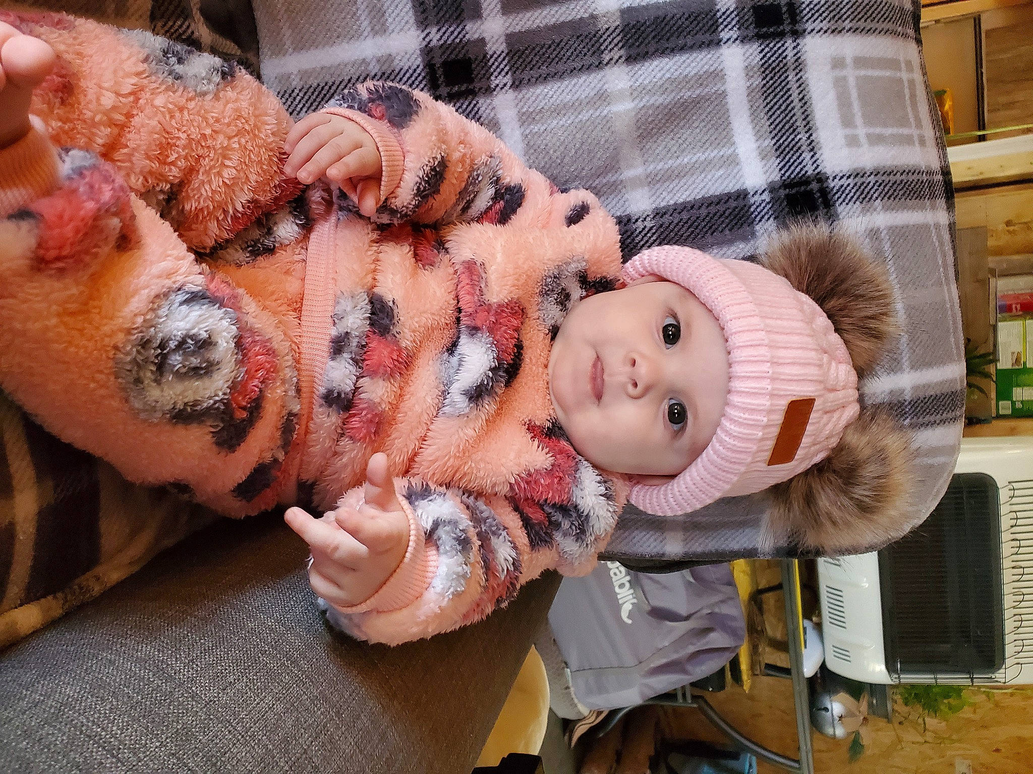 Kynzlee joined the competition — help win amazing prizes! baby, child, comfort, fawn, flesh, fur, hat, headwear, nail, pattern, person, plaid, plant, room, smile, tartan, toddler, toy, wood