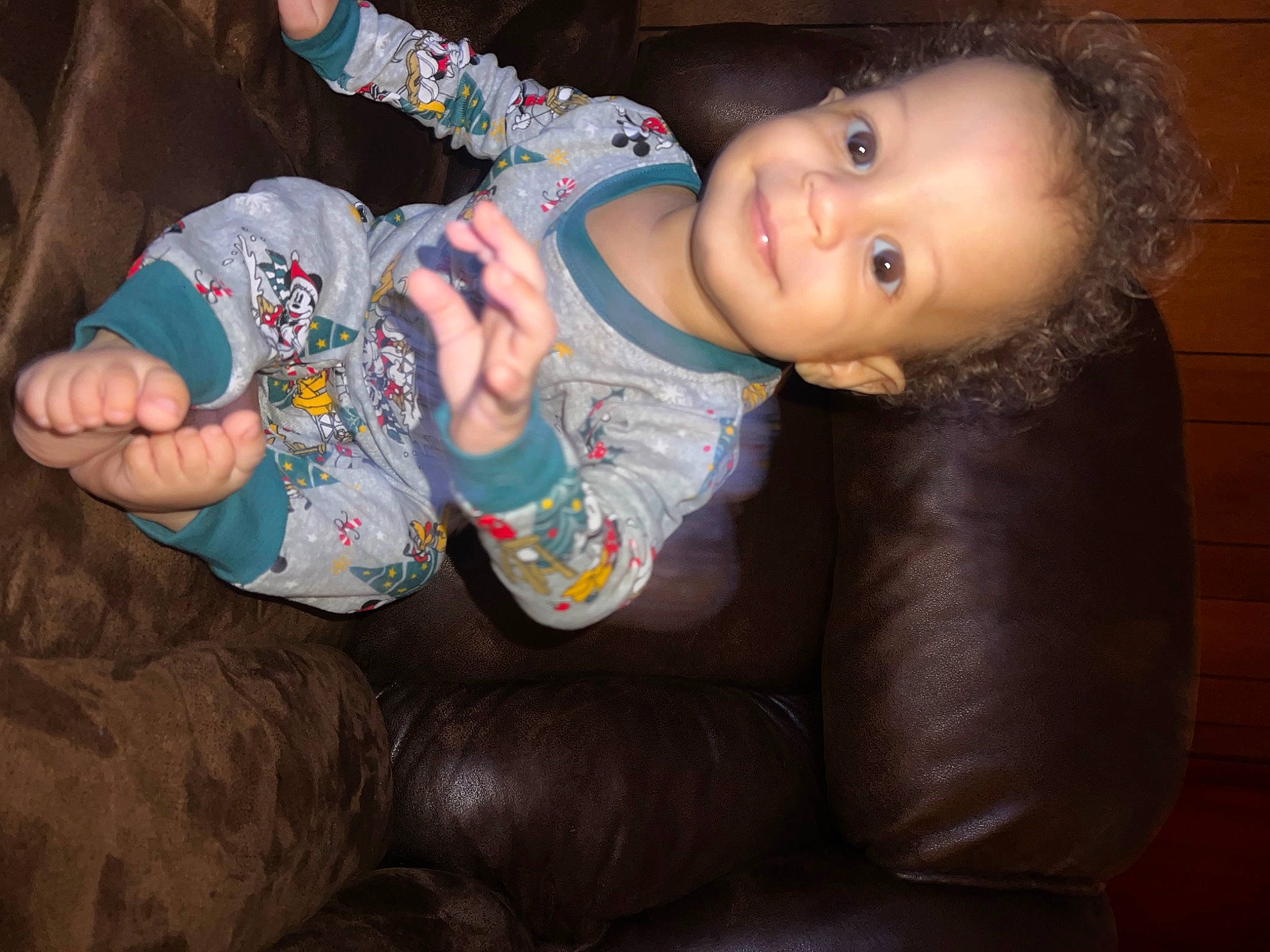 Kareem is registered to the contest to win money with this photo: baby, baby_toddler_clothing, cheek, child, comfort, eye, finger, foot, fun, head, human_body, joy, lap, mouth, nose, person, skin, sleeve, smile, thigh