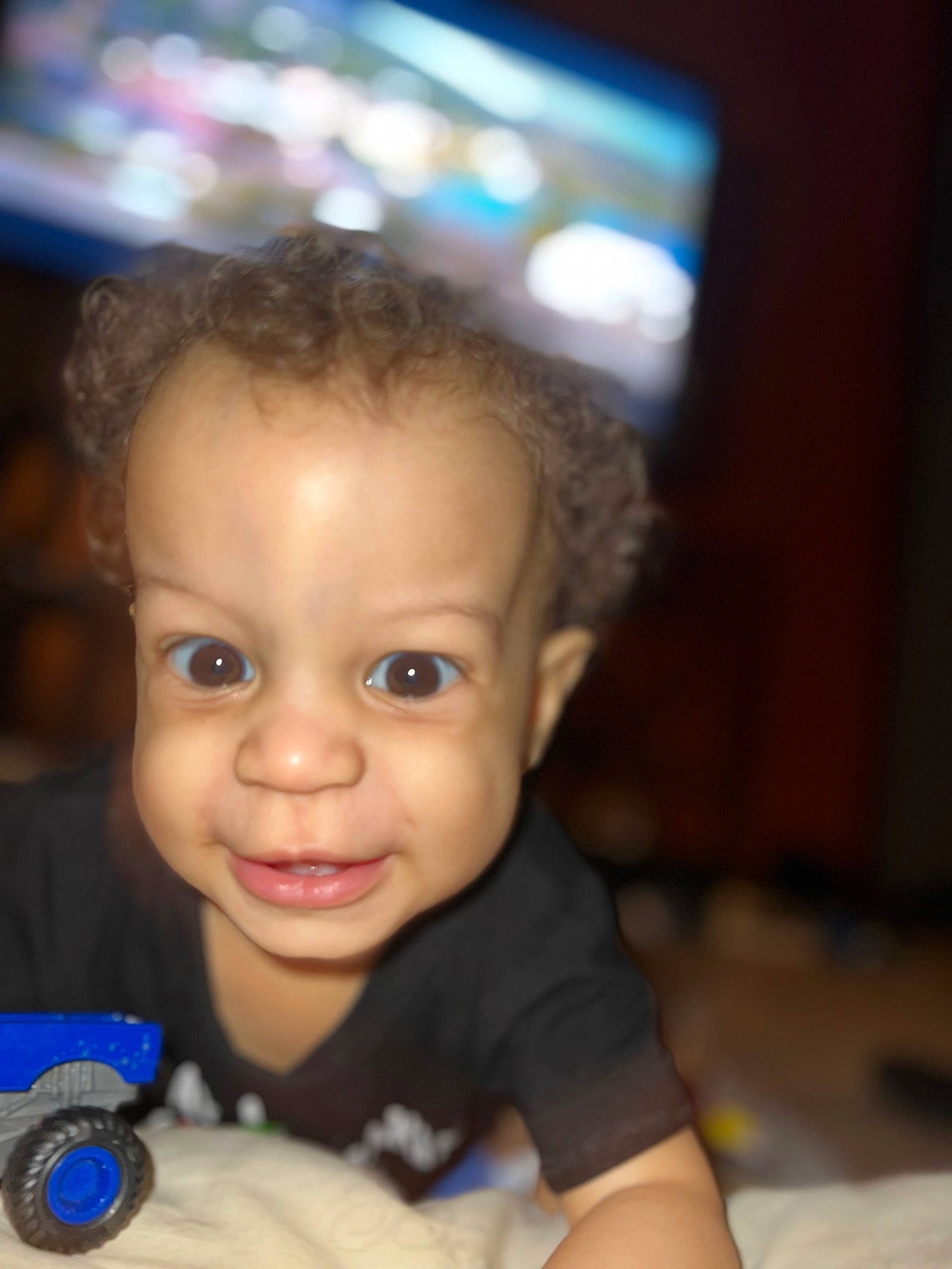 Kareem is registered to the contest to win money with this photo: baby, baby_toddler_clothing, camera, cheek, child, electric_blue, eye, eyelash, facial_expression, flash_photography, fun, happy, iris, mouth, nose, person, portrait_photography, sitting, skin, smile