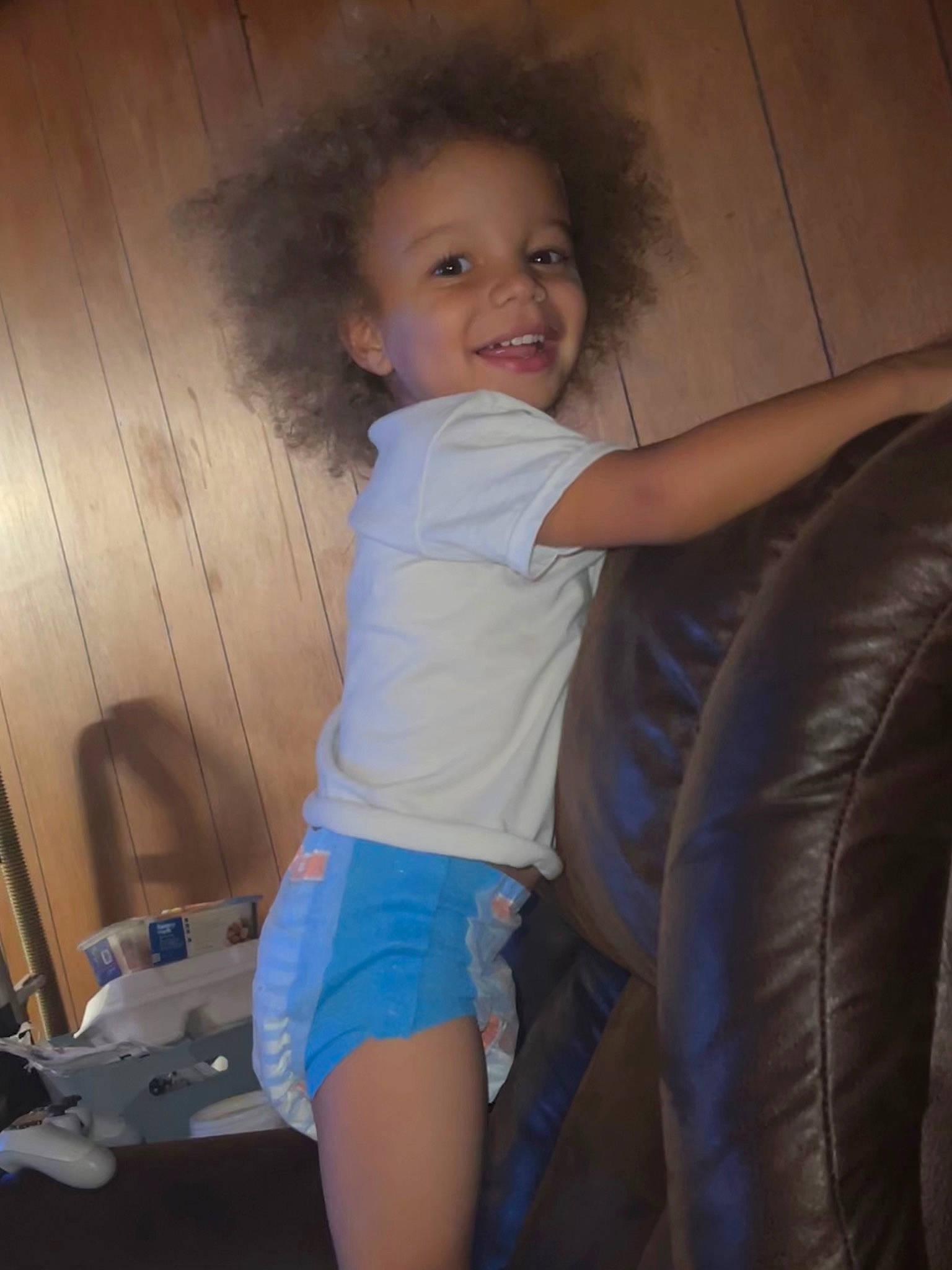 Kyrin is registered to the contest to win money with this photo: chest, child, electric_blue, flash_photography, happy, human_leg, jean_short, joy, knee, long_hair, muscle, organ, person, shorts, shoulder, skin, smile, standing, thigh, toddler