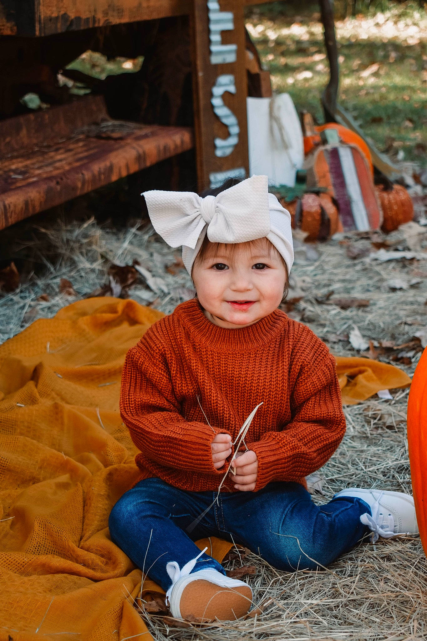 Avie joined the competition — help win amazing prizes! baby, baby_toddler_clothing, calabaza, child, cucurbita, fun, gourd, grass, happy, headwear, joy, leisure, orange, people_in_nature, person, plant, pumpkin, sitting, smile, toddler