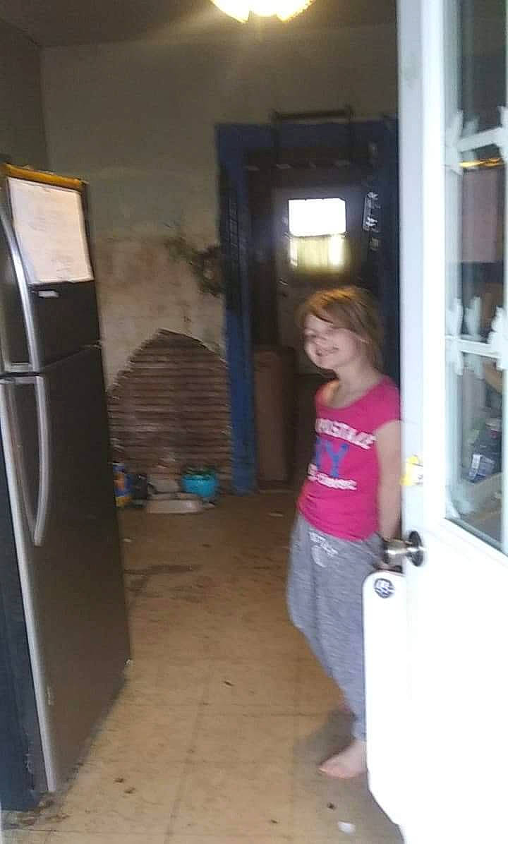 Emilie is registered to the contest to win money with this photo: door, floor, flooring, joy, person, room, shoulder, standing