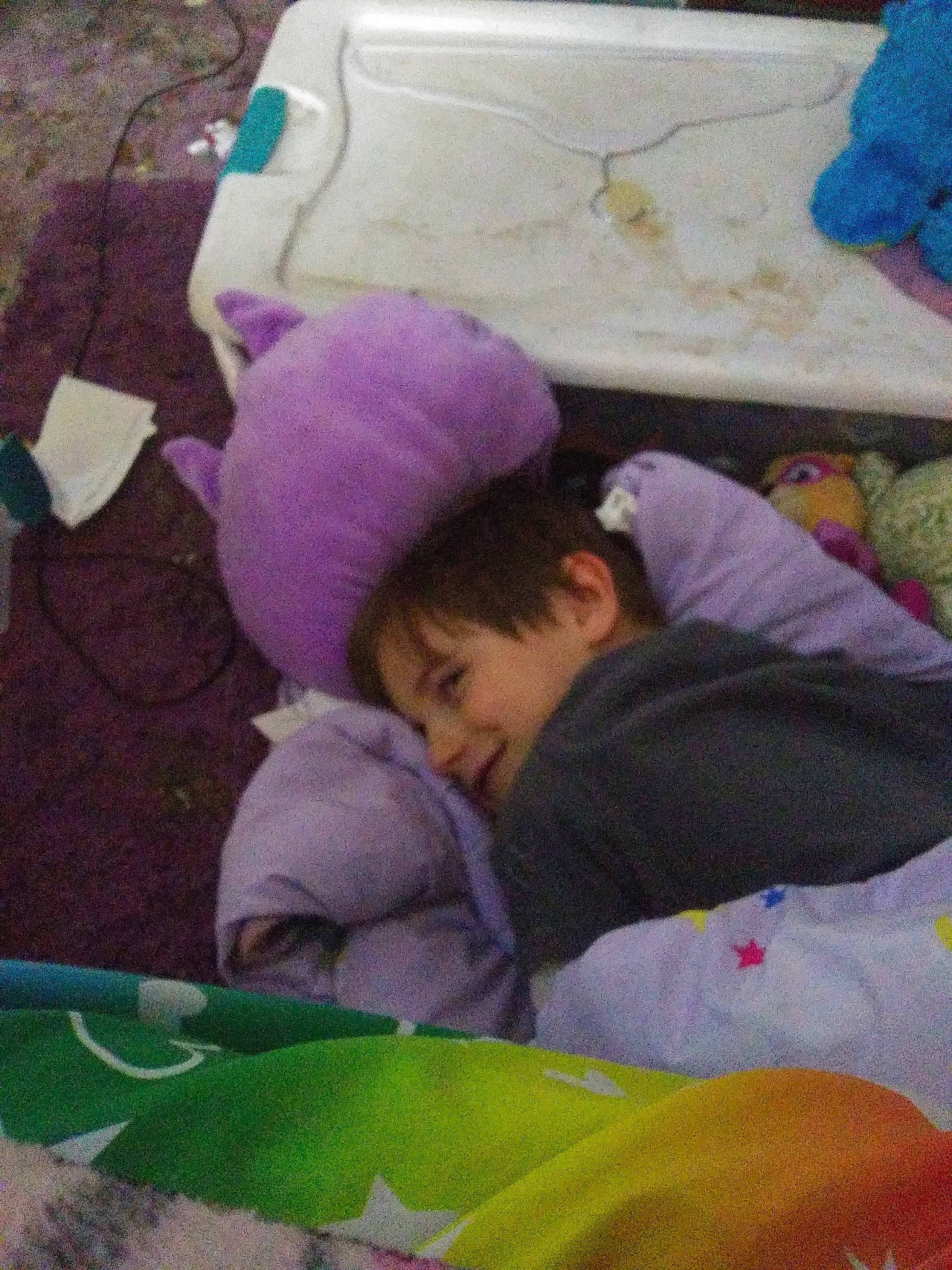 Blake is registered to the contest to win money with this photo: baby, child, nap, person, play, purple, sleep, toddler