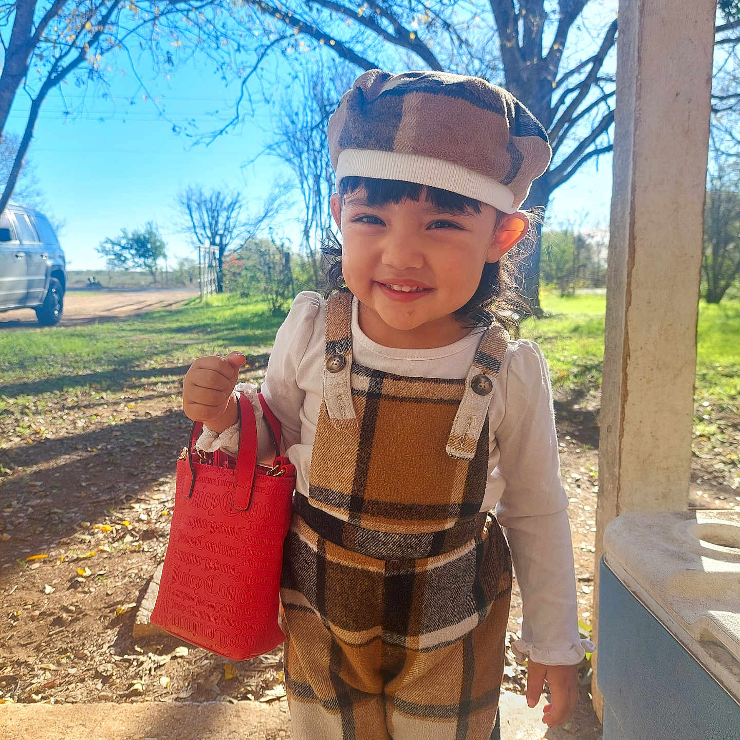 Kalila is registered to the contest to win money with this photo: accessories, bag, baseballcap, boy, cap, child, clothing, face, grass, handbag, hat, head, male, pants, person, photography, plant, portrait, tree, vegetation