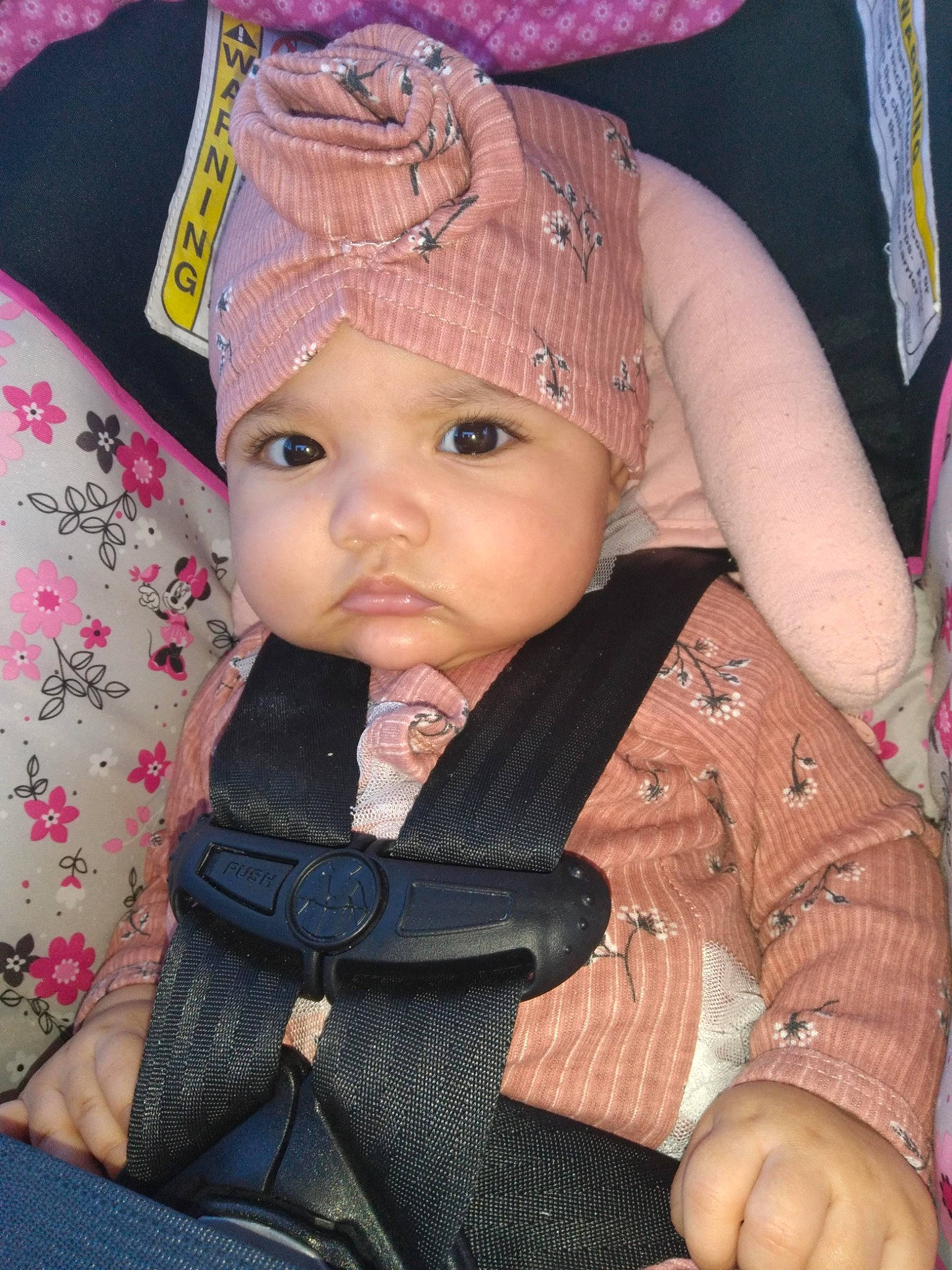 Kalila joined the competition — help win amazing prizes! baby, baby_toddler_clothing, cap, cheek, child, chin, clothing, costume_hat, fashion_accessory, headwear, iris, knit_cap, magenta, outerwear, pattern, person, pink, skin, sleeve, textile