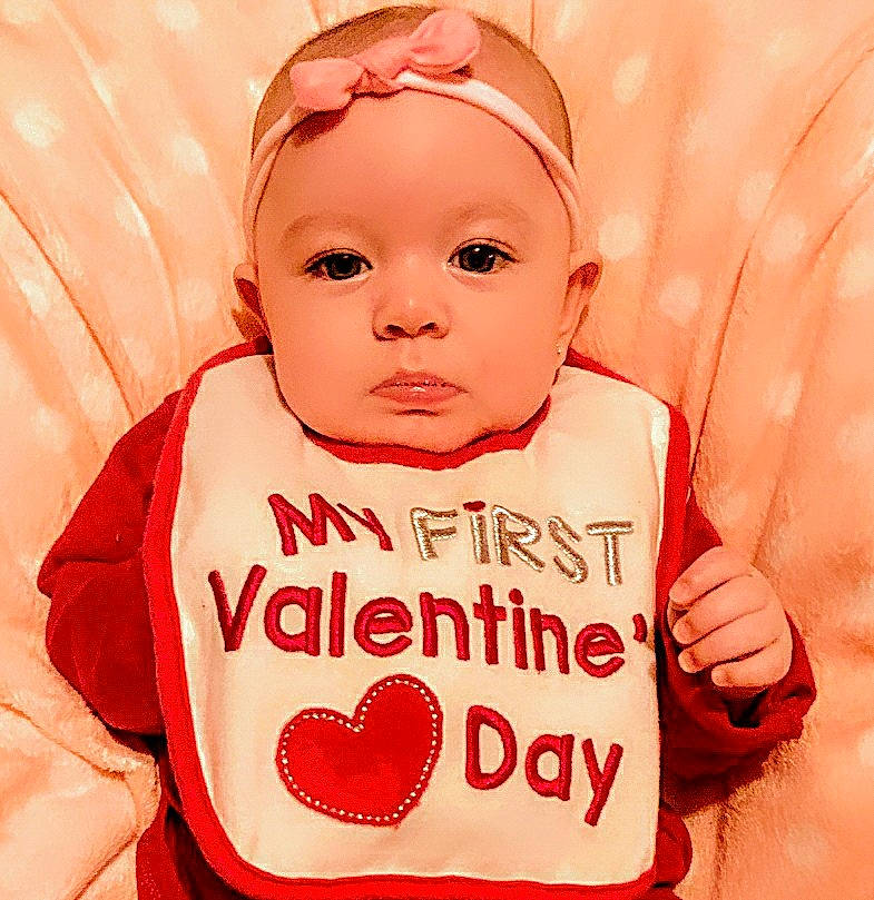 Paisley joined the competition — help win amazing prizes! baby, baby_toddler_clothing, cap, cheek, chin, cool, facial_expression, happy, human_body, lip, mouth, neck, nose, organ, outerwear, person, pink, skin, sleeve, t_shirt