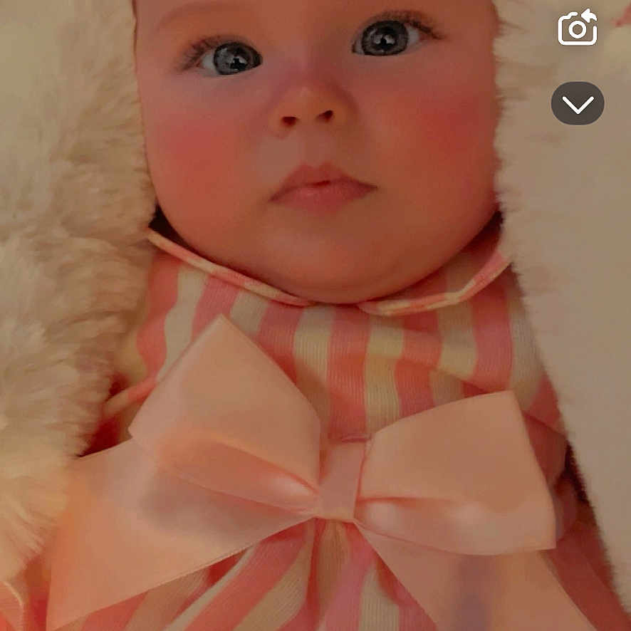 Nevaeh Rikki joined the competition — help win amazing prizes! baby, blanket, bodypart, bonnet, clothing, cushion, doll, electronics, face, finger, hand, hat, head, homedecor, newborn, person, photography, portrait, text, toy