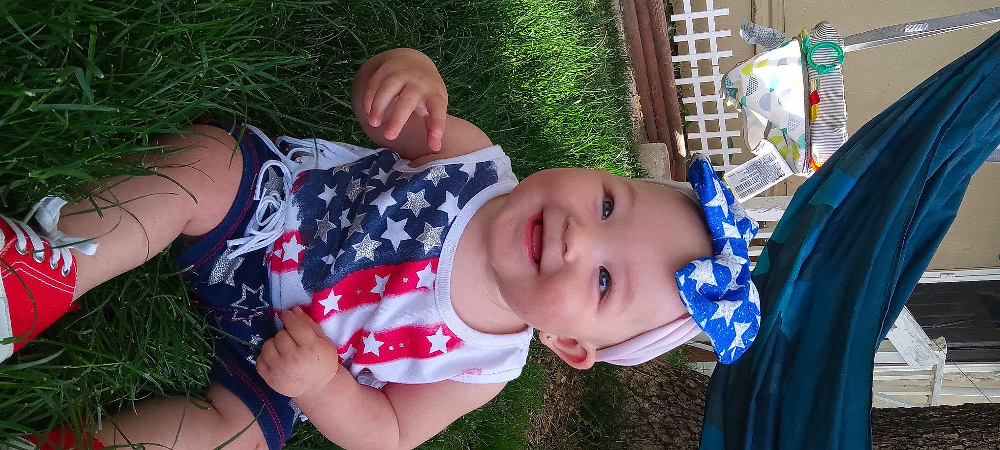 Zaya is registered to the contest to win money with this photo: baby, baby_toddler_clothing, child, fun, grass, happy, hat, joy, leisure, pattern, people_in_nature, person, plant, smile, thigh, toddler, tree, vacation