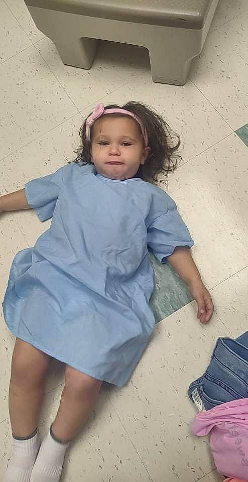 Juliany is registered to the contest to win money with this photo: barefoot, child, day_dress, dress, fashion_design, flash_photography, fun, hairstyle, happy, human_leg, joint, knee, person, purple, sand, sitting, skin, sleeve, standing, thigh