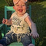 baby, child, smiling, happy, outdoor, grass, chair, bow, headband, tank_top, denim, pants, shoes, tongue_out, sunlight, greenery, person, portrait, casual_clothing, cute